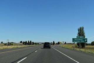 Diamond Hill Road leads five miles west from I-5 to the city of Harrisburg. Following OR 99E southbound from Harrisburg leads to Junction City, named in the 1880s for a hoped-for (but unrealized) railroad junction. The city later became the south split of U.S. 99.