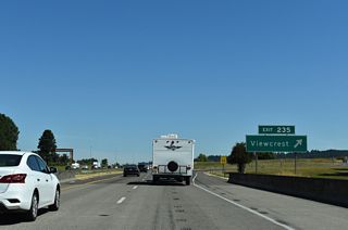 Exit 235 consists of RIRO (right in right out) ramps with parallel Century Drive north of Old Salem Road. Old Salem Road represents a portion of the old Pacific Highway between Albany and Salem.