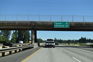 Continuing north from Dever-Conner Road, I-5/OR 99E reaches Salem in 15 miles. Portland is 61 miles away.