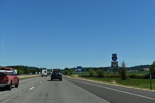 Shifting east, I-5/OR 99E run west of Looney Butte on the ensuing stretch.