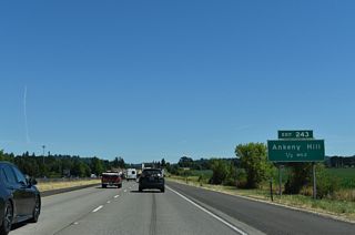 Interstate 5 meets Ankeny Hill Road at Exit 243, a typical rural diamond interchange.