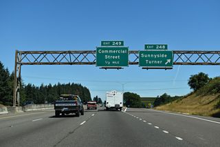 Exit 248 departs I-5/OR 99E north for Delaney Road. Directly east of the freeway along Rodgers Creek is the Enchanted Forest. Located along the frontage road (Enchanted Way SE), this local attraction began as the work of single individual in the 1960s. It eventually grew into a full-fledged amusement park with a storybook theme.