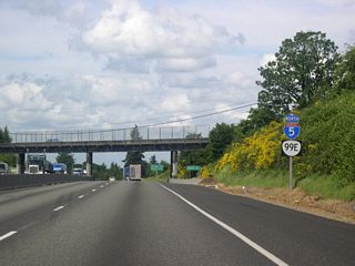Formerly routed north along Commercial Street to OR 22 and the Salem city center, OR 99E remains co-signed with Interstate 5 past Exit 249.