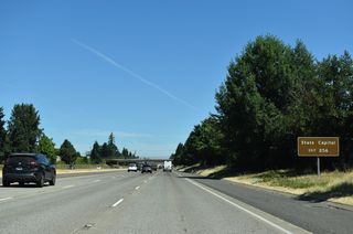 West from Exit 256, Market Street heads to the couplet of Summer Street and Capital Street, the former alignment of OR 99E, north of the Oregon State Capitol.