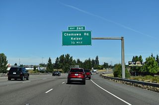 Forthcoming Exit 260 for Chemawa Road and the city of Keizer also leads motorists toward the Oregon Garden. Located in the city of Silverton and dedicated in 1999, the site features over 20 specialty gardens and is watered with recycled wastewater.