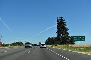 The first distance sign after leaving the Salem area shows Portland is 40 miles away. Distances to Seattle are no longer provided.