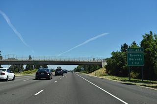 Continuing north, Interstate 5 travels one mile to Exit 263 for the unincorporated community of Brooks. Parallel OR 99E (Pacific Highway East) leads northeast from Brooks to the city of Gervais.