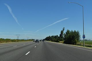 The linear stretch north from Brooks leads Interstate 5 eight miles to the city of Woodburn.