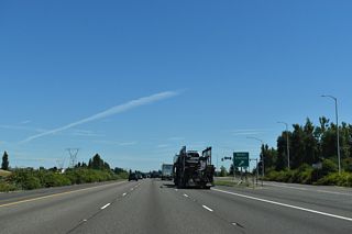 The weigh station north of Woodburn operates with a &quot;green light&quot; weigh-in-motion preclearance site, allowing trucks equipped with certain transponders to bypass the station. This option saves fuel and reduces emissions.