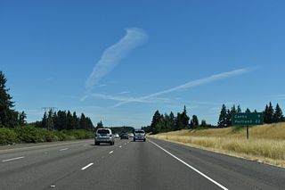 The next exit northbound references Canby, a city to the east accessed indirectly from Interstate 5 via area roads east. Portland is 22 miles away.