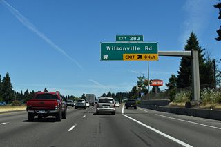 The second and last Clackamas County exit along I-5 north departs for Wilsonville. A city of over 26,000, Wilsonville was once a small farming community with a population of just 1,750 in 1980.