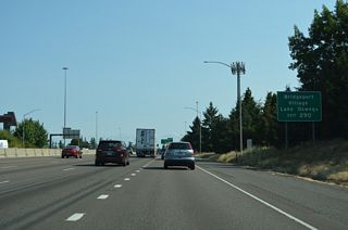 Bridgeport Road extends west from Lower Boones Ferry Road at parallel SW 72nd Avenue to the Bridgeport Village retail center. East from Exit 290, Lower Boones Ferry Road enters the city of Lake Oswego in 0.3 miles at the Southern Pacific Railroad crossing.