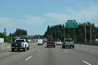 More industrial parks line both sides of I-5 one half mile out from Exit 291 to Carman Drive east and Upper Boones Ferry Road west.