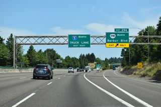 Barbur Boulevard leads OR 99W southwest from I-5 into Tigard. The state route was decommissioned between Exit 294 and SW Capitol Highway, and renumbered to OR 10 north from Capitol Highway to U.S. 26 (Ross Island Bridge).