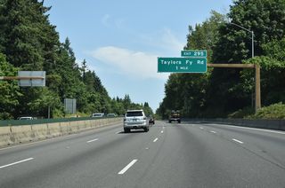 I-5 weaves northeast between the Crestwood and West Portland Park neighborhoods one mile to Exit 295 for Taylors Ferry Road. Heading east, Taylors Ferry Road navigates across the hills of southwest Portland, eventually reaching OR 43 near the Willamette River.