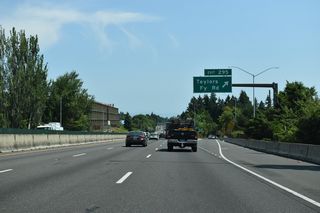 The original construction of I-5 severed Taylors Ferry Road. Exit 295 consists of a slip ramp onto adjacent SW 35th Avenue for the continuation of SW Taylors Ferry Road east at the Markham neighborhood.