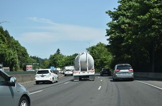 Turning north from the Terwilliger Curves, Interstate 5 travels between OR 99W (Barbur Boulevard) and the South Portland neighborhood along OR 43 (Macadam Avenue).
