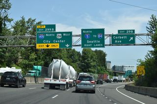 Exit 298 constitutes just a single ramp from I-5 northbound to Corbett Avenue. I-5 separates with SW Harbor Drive north at the ensuing exit for Interstate 405 (Stadium Freeway).
