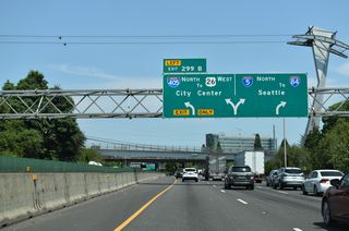 Until 1974, South Harbor Drive spurred north through the Riverplace neighborhood toward the Steel Bridge along the Willamette Riverfront. The freeway was removed and converted into parkland at that time, leaving a short at-grade roadway extending from I-405 (Stadium Freeway) to Naito Parkway (former OR 99W).