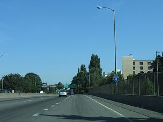 Northbound I-5 shield assembly posted on the viaduct above Holladay and Multnomah Streets at the Lloyd District in Portland.