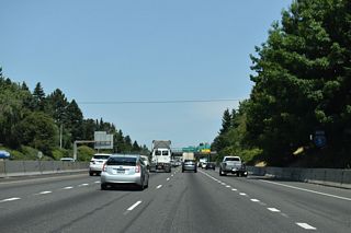 Having cleared the Downtown area of Portland, northbound I-5 advances through Portland's north side neighborhoods. Constructed in the early 1960s in place of Minnesota Avenue, most of Interstate 5 along this stretch is below grade. Historically I-5 was referred to as the Minnesota Freeway here.