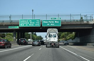 The diamond interchange (Exit 304) with Rosa Parks Way is one quarter mile beyond the Killingsworth Street over crossing.