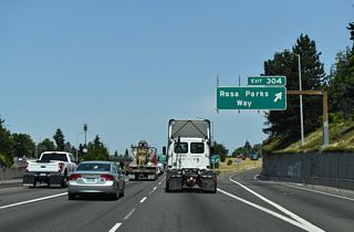 Exit 304 departs I-5 north for Rosa Parks Way. Formerly Portland Boulevard, the minor arterial street joins the Arbor Lodge and Piedmont neighborhoods in north Portland.