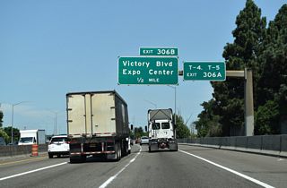 Exit 306 B joins I-5 north with Victory Boulevard west and Whitaker Road south by Delta Park and Delta Park Center retail area.