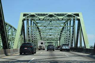 Interstate 5 crosses the Columbia River north from Portland, Oregon across the Interstate Bridge Interstate 5 crosses the Columbia River north from Portland, Oregon across the Interstate Bridge