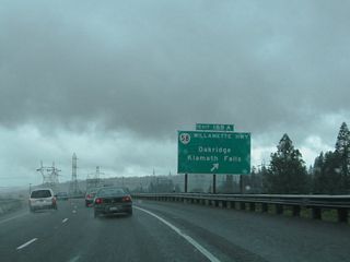 Interstate 5 passes over the Southern Pacific Railroad line and Franklin Boulevard (Old U.S. 99) ahead of Exit 188. Named Willamette Highway because of the river it parallels, OR 58 leads east four miles to Pleasant Hill, 13 miles to Lowell, and 34 miles to Oakridge.