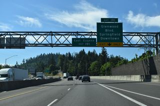 OR 126 Business (Franklin Boulevard) heads east from Glenwood Drive to Downtown Springfield and west to the University of Oregon and Eugene central business district.