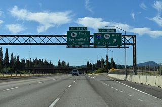 Interstate 105 spurs 3.49 miles west to Delta Highway (OR 132) by Valley River Center and south across the Willamette River to OR 99/126 Business (6th/7th Avenues) west of Downtown Eugene.