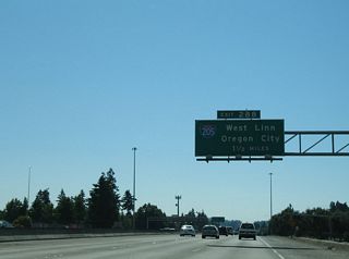 OR 217, a 7.52 mile long freeway south from U.S. 26 (Sunset Highway) at Beaverton, concludes at I-5 via a wye interchange at Kruse Way. Kruse Way ties into the freeway to the west of Exit 292 and is a divided arterial east into Lake Oswego.