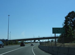 The parclo interchange at Exit 292 connects I-5 south connects to Kruse Way just ahead of OR 217.