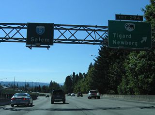 The wye interchange at Exit 294 overlays a half diamond interchange with Interstate 5 north. OR 99W follows Pacific Highway southwest through Tigard to Sherwood and Newberg.