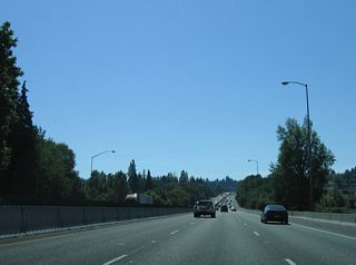 The six lanes of Interstate 5 travel between the Multnomah and Markham neighborhoods of southwest Portland.