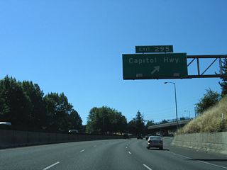 Exit 295 joins Interstate 5 south with Taylors Ferry Road west of Capitol Highway at Crestwood. Capitol Highway continues south of the freeway to become SW 49th Avenue at the Far Southwest neighborhood.