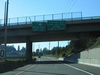 Exit 297 splits into lanes for Barbur Boulevard west to Capitol Hill, Bertha Boulevard north to Hillsdale and Barbor Boulevard east to Terwilliger Boulevard.