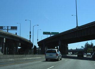 Exit 300 B partitions above I-5 for the Belmont Street viaduct east to OR 99E (Martin Luther King, Jr. Boulevard south / Grand Avenue north) at the Buckman section of Portland, and the Morrison Bridge west to the city center.