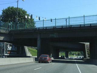 Similar to the configuration in Seattle where Pine Street and Boren Avenue intersect above the freeway, Interstate 5 in Portland passes under the intersection of Williams Avenue and NE Broadway.