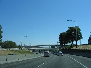 Ramp stubs remain on both flyover ramps to I-405 for the Kerby Avenue connector. The Stadium Freeway spurs east from I-5/U.S. 30 to Kerby Avenue at Gantenbein Avenue. Part of the cancelled Rose City Freeway northeast to the unconstructed Prescott Freeway, the freeway spur provides local access to the Boise section of the city from the Fremont Bridge.
