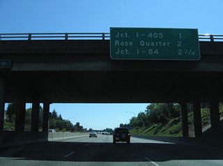 I-405 (Stadium freeway) begins one mile south of the Rosa Parks Way overpass.