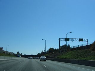 Minnesota Avenue, which Interstate 5 replaced when it was built through north Portland, runs along the west side of the c/d roadway at Exit 303.