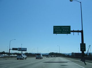 A single lane ramp serves both OR 99E south and Marine Drive west at Exit 307. Marine Drive serves the Portland Metro Expo Center at West Delta Park. East Delta Park lines the east side of Interstate 5, south of Martin Luther King, Jr. Boulevard.