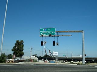 Exit 307 ties into Marine Drive across from the northbound entrance ramp onto Hayden Island. Marine Drive splits with OR 99E (MLK, Jr. Boulevard) east of the exchange.