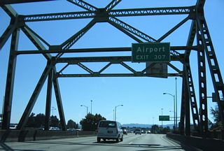 Travelers bound for Portland International Airport (PDX) that did not either take Washington State Route 14 east or I-205 south from I-5 south are directed onto OR 99E south to U.S. 30 Bypass east from Exit 307.