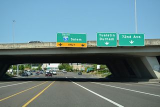 Lower Boones Ferry Road angles southwest from Lake Oswego into northern reaches of Tualatin, where the arterial meets Interstate 5 at a diamond interchange (Exit 290).
