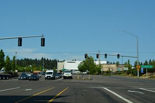 Beyond the southbound entrance ramp to Salem, Lower Boones Ferry Road turns south at SW 72nd Avenue and SW Bridgeport Road by a park &amp; ride facility.