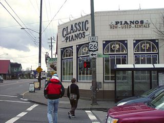 Milwaukie Avenue south at U.S. 26 (Powell Boulevard) and the start of the 3000 block for Milwaukie Avenue.