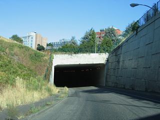 The ramp to Interstate 405 north passes through a tunnel below the Stadium Freeway.